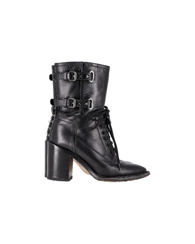 Valentino Garavani Rockstud Double-Buckle Heeled Boots in Black Leather